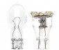 8-LED Miniature Wedge Base LED Tier Light Bulb with incandescent t5 base bulb for size comparison