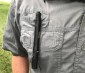 Flashlight Clipped to Shirt Pocket