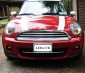 Side emitting LED weatherproof flexible light strips installed in the grille of a Mini Cooper for use as a daytime running light