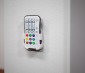 Wall mount cradle offers an easy place to store and access remote control.