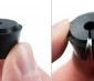 At each end of the connector is a rubber grommet with a hole for the wire to pass through. There is a hairline seam that can be pulled apart before use in an application, as shown above.