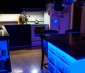 Customer installed color chasing Dream Color LED Strips around kitchen island to create cool accent lighting and floating effect. 