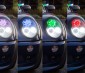 LED Angel Eye Headlight Accent Light Kits: Shown On And Installed In Headlight Housing In Purple, Blue, Green, And Red Color Modes. 