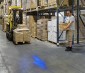 Blue LED Safety Light w/ Arrow Beam Pattern: Installed on Forklift in Warehouse