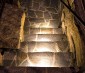 LED Hardscape Lighting - 8"  Deck / Step and Retaining Wall Lights w/ Mounting Plates: Showing 12' Version Installed In Custom Staircase In Warm White. 