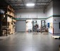 Single Fixture Illuminating Warehouse Station (Front View)