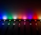 Little Dot SMD LED Accent Light: Shown On In Blue, Cool White, Green, Natural White, Amber, Pink, Ultra Violet, Red, And Warm White. (From Left)