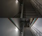 50W Low Bay LED Light Fixture - Industrial LED Light - 4' Long: Shown Installed By Warehouse Steps And Compared To Florescent Fixture. Florescent Top, LED Bottom. 