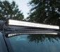 40" Off Road LED Light Bar - 120W: Shown Installed On SUV Roof And On. 