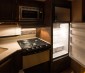 T22 LED Replacement Bulb for WB36X10003 and other Microwave Light Bulbs: Shown Installed In Mini Fridge And Range Hood. 