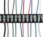 12 Position Barrier Terminal Block - 14-22 AWG: Typical RGB Setup- Red, Green, Blue, White, & Ground Linked Via Terminal Block Jumper with Positive and Negative Power Wires on the Left.