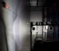 50W Quad Side Shooter LED Work Light - 5,100 Lumens - 6500K: Showing Side Beam Hitting Warehouse Wall
